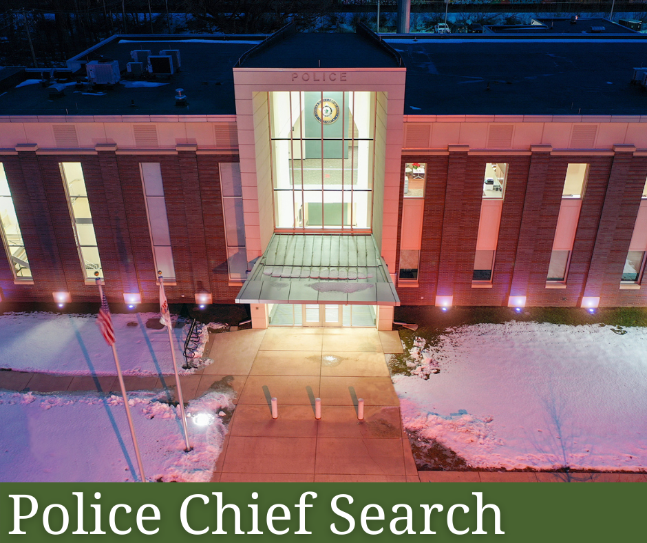 The DeKalb Police Department at night.