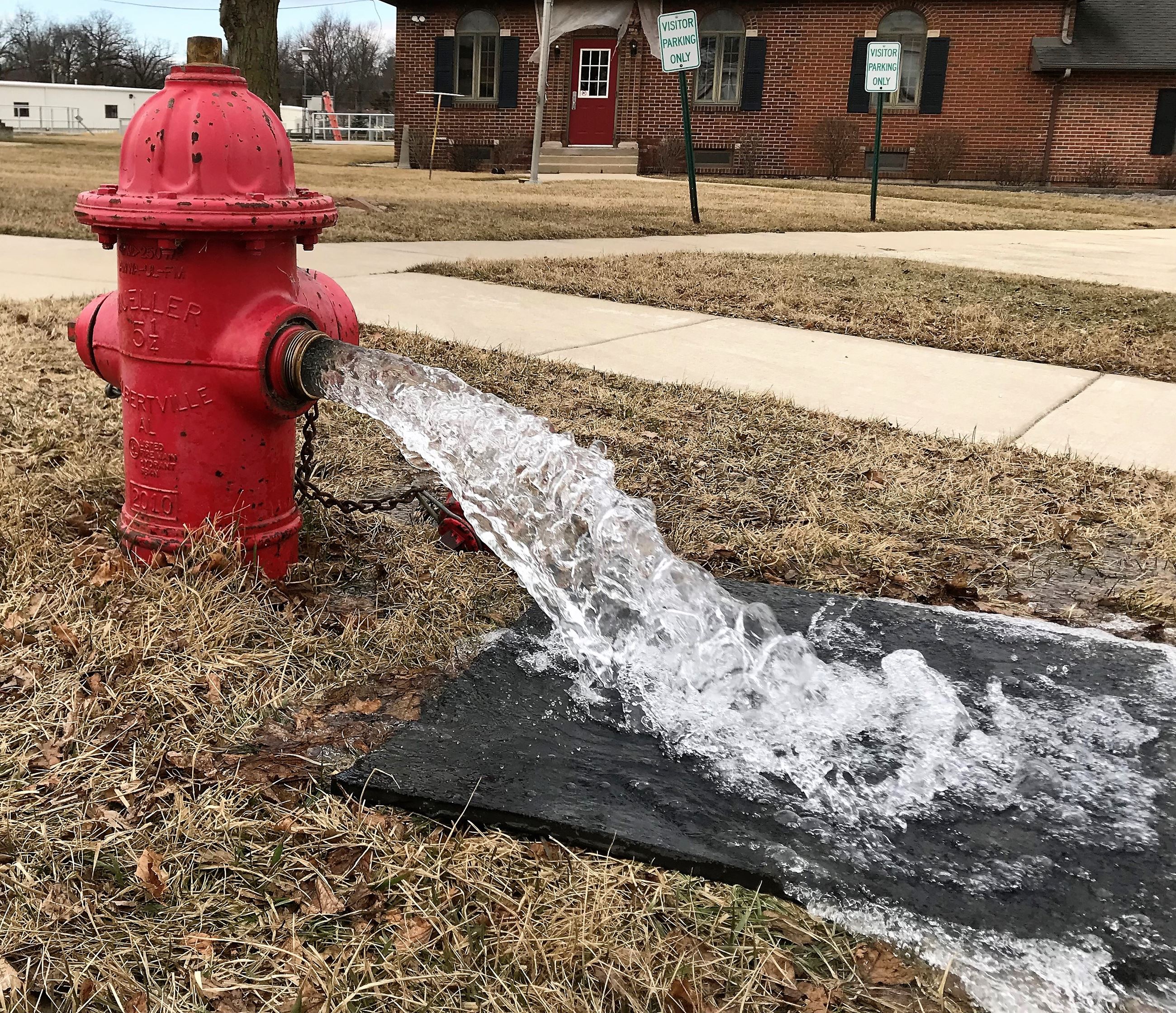 A hydrant is flushed.