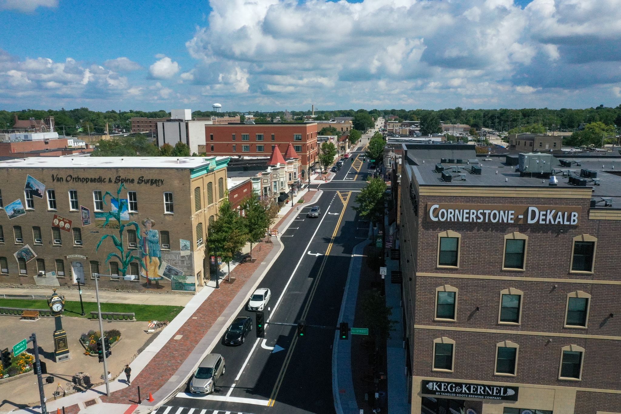 A drone shot shows the narrowed Lincoln Highway from First Street, looking east