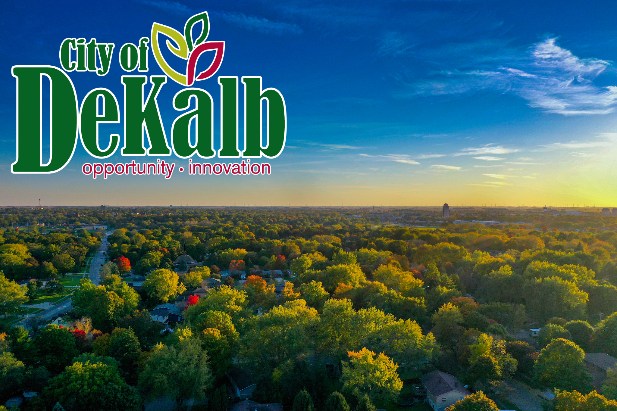 The DeKalb logo over an aerial shot of the City