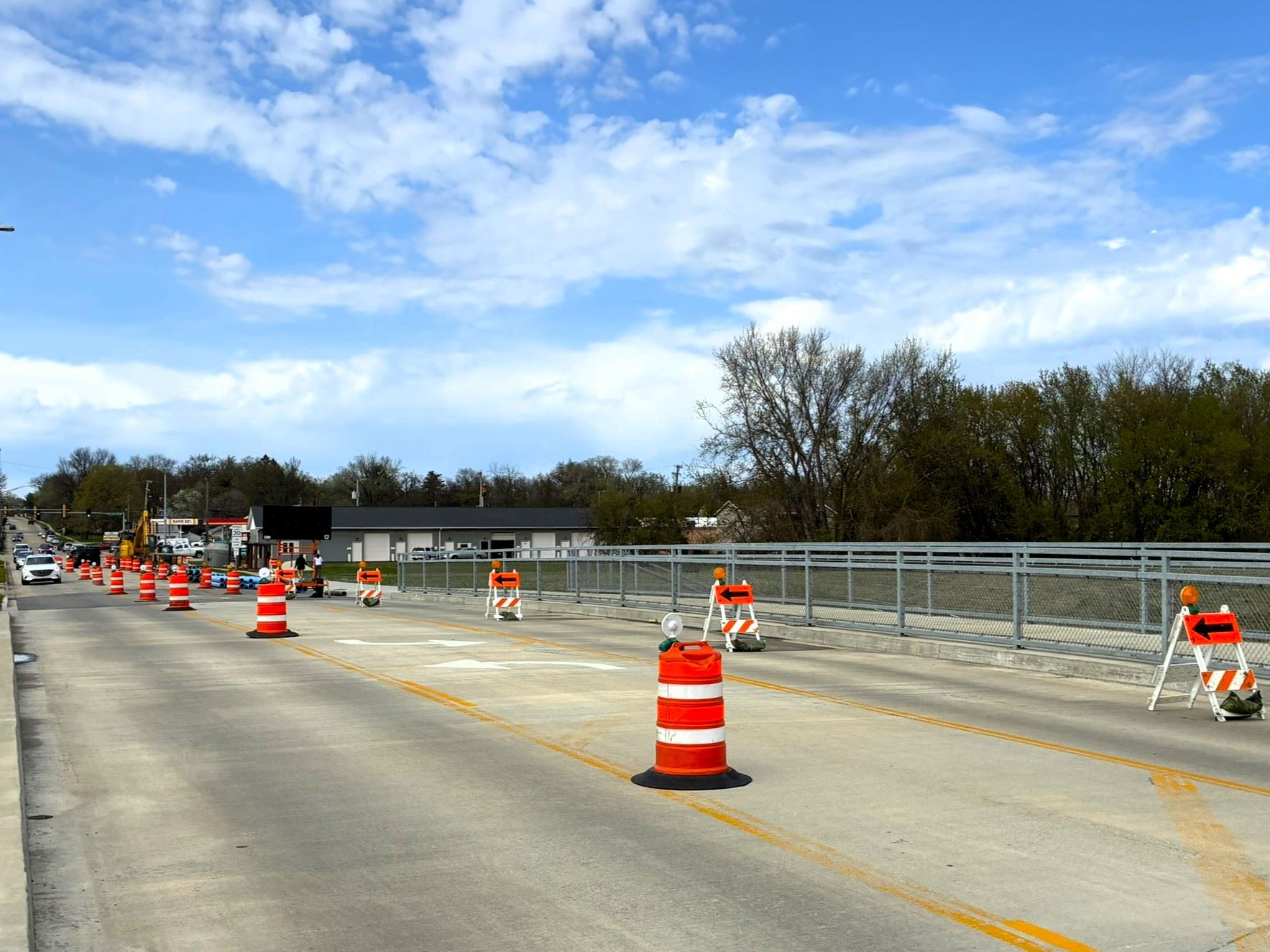Orange construction barrels placed on the North First Street bridge