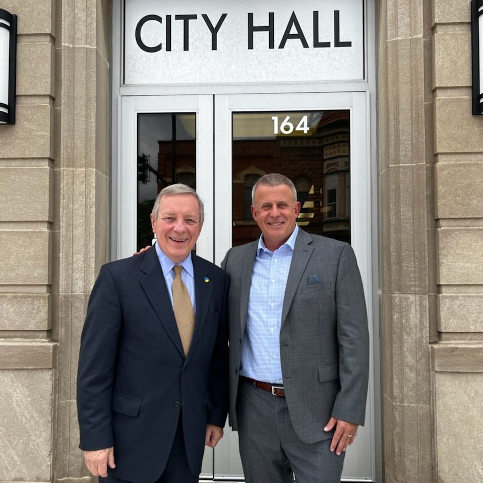 Senator Dick Durbin and Mayor Cohen Barnes outside DeKalb City Hall