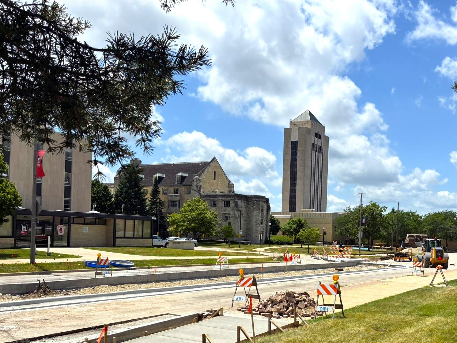 Construction activity on Lucinda Avenue with the Holmes Student Center in the background